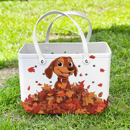 Spheregoods Cee™ Bag Puppy with a pile of autumn leaves