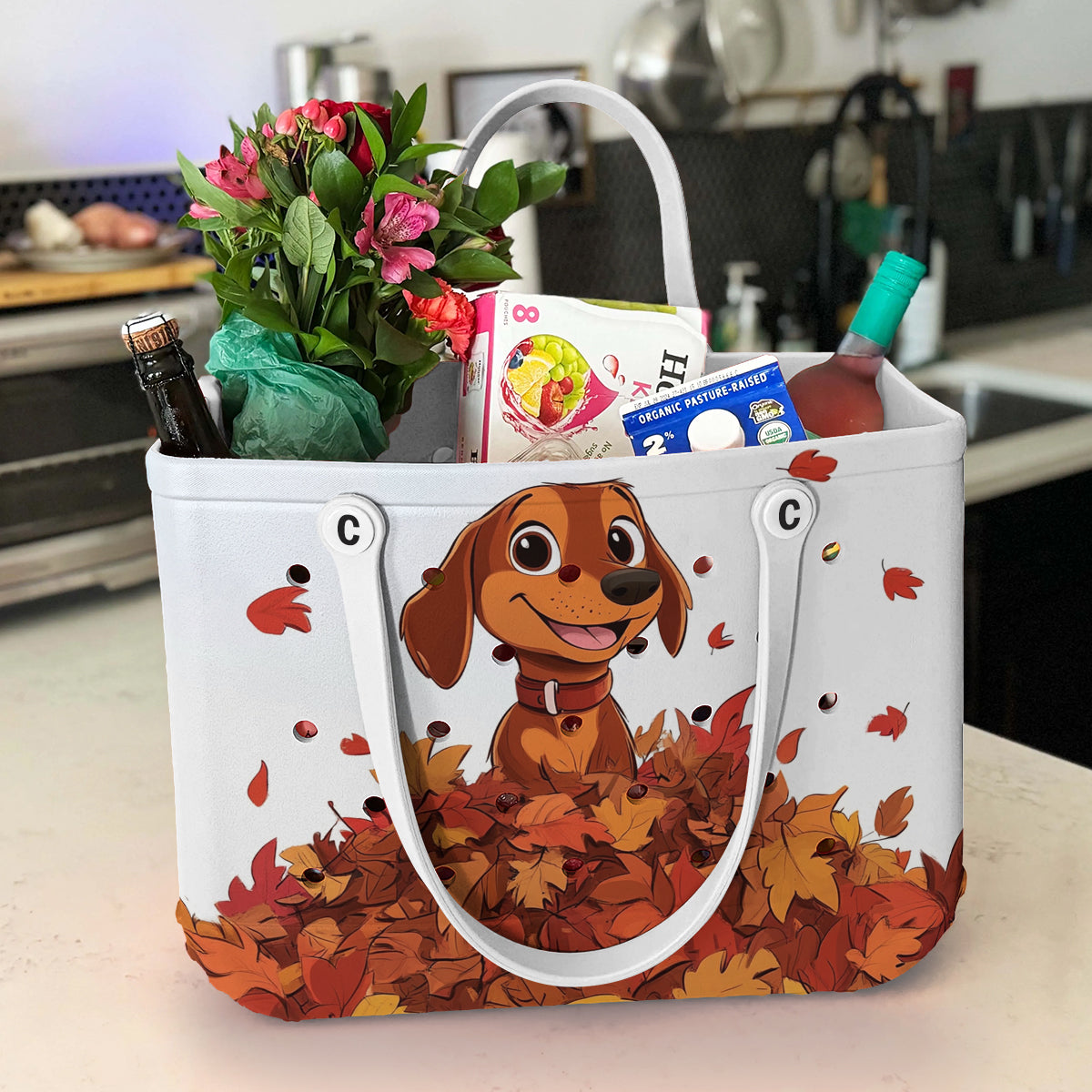 Spheregoods Cee™ Bag Puppy with a pile of autumn leaves