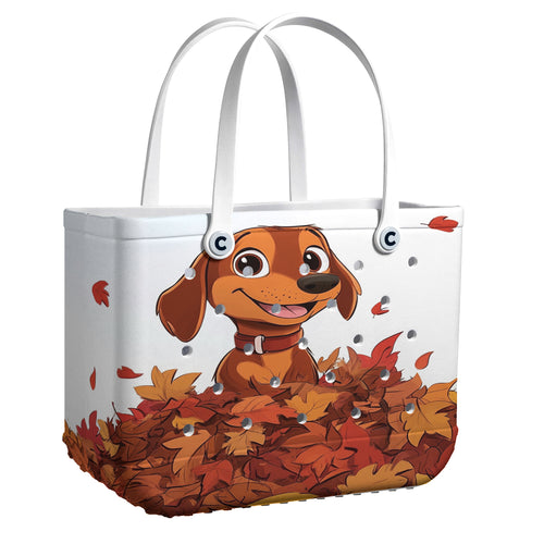 Spheregoods Cee™ Bag Puppy with a pile of autumn leaves